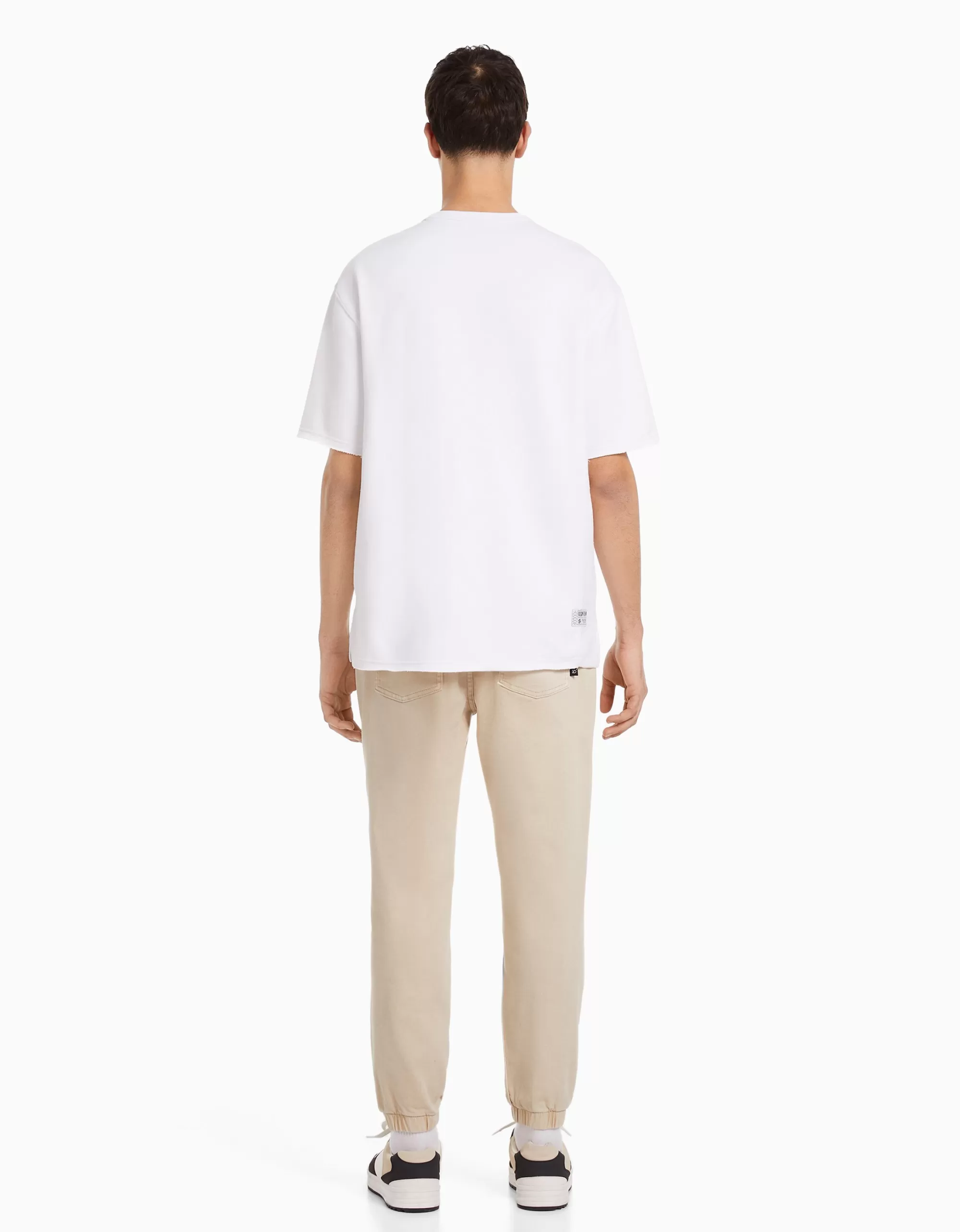 HOMBRE BERSHKA Jeans jogger color rotos