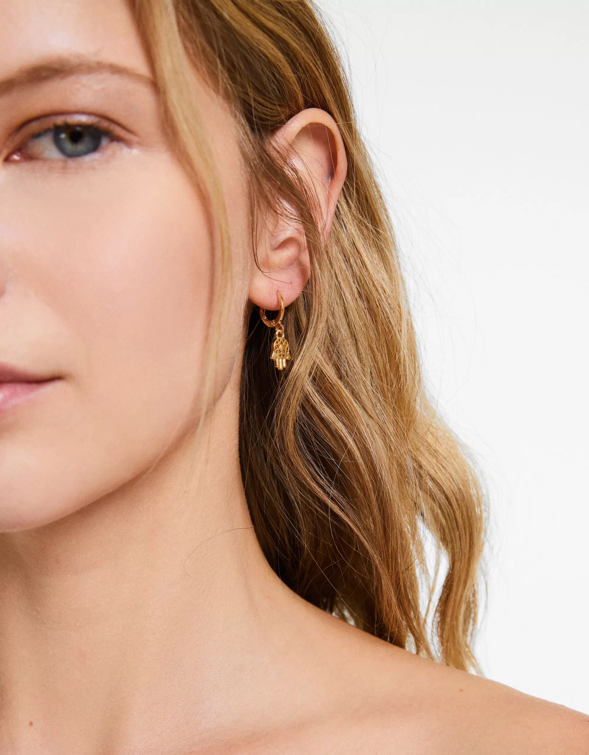 MUJER BERSHKA Set 10 pendientes ear cuff cruz